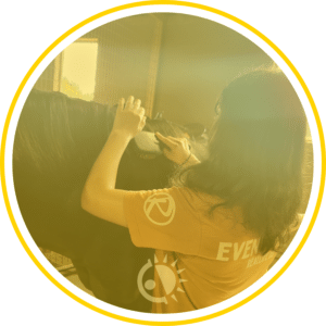 Child brushing a horses mane.